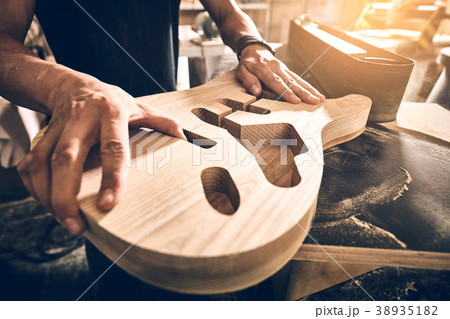 Manufacture of guitars. 38935182