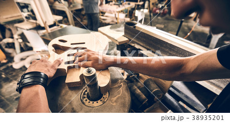 Manufacture of guitars. 38935201