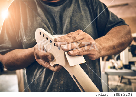 Manufacture of guitars. 38935202