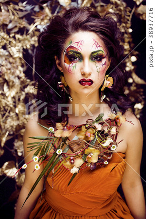 beauty woman with face art and jewelry from beauty woman with face art and jewelry from 38937716