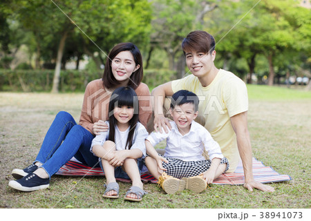 relax and happy family in the park relax and happy family in the park 38941073
