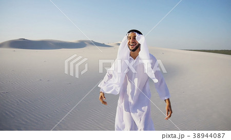 Muslim Arabian UAE Sheikh architect sitting with Muslim Arabian UAE Sheikh architect sitting with 38944087