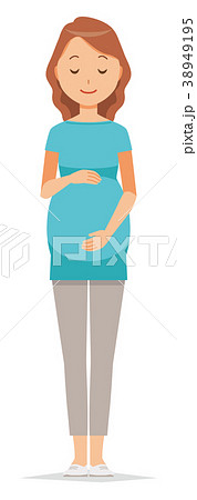 グリーンの服を着た妊婦が笑顔でお腹を見ている 38949195