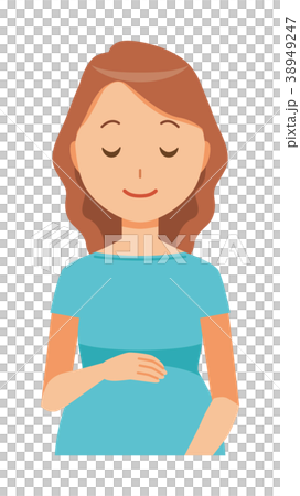 グリーンの服を着た妊婦が笑顔でお腹を見ている 38949247