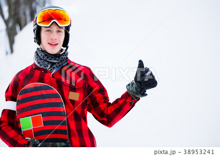 Picture of athlete in helmet with snowboard on Picture of athlete in helmet with snowboard on 38953241