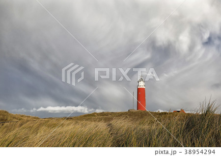 dramatic sky over ed lighthouse on hill 38954294