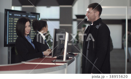 Airport security personnel checking identification Airport security personnel checking identification 38955620