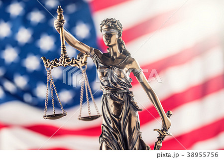 Lady Justice and American flag. Lady Justice and American flag. 38955756