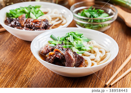 Japanese Udon noodles with beef 38958443