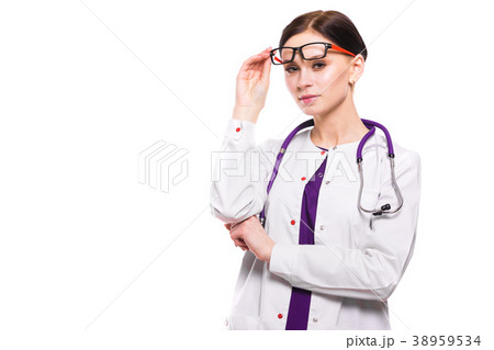 Young beautiful female doctor with raised glasses 38959534