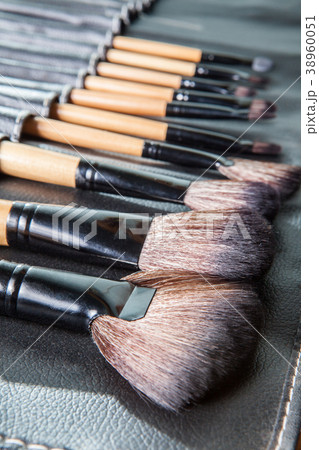 Set of  makeup brushes in row black leather cover  38960051