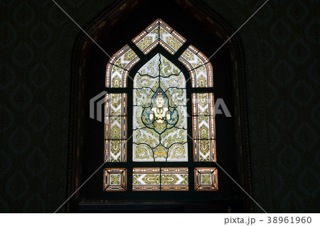 Thai art on window of Church at the Marble temple. Thai art on window of Church at the Marble temple. 38961960