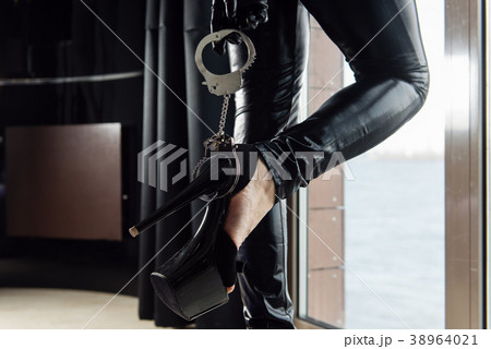 Sexy female feets with high heels and handcuffs - Stock Photo [38964021] -  PIXTA