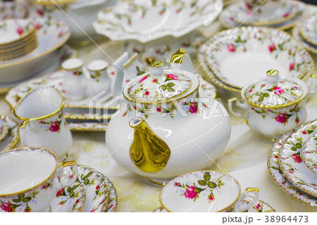 antique tea set with floral print 38964473