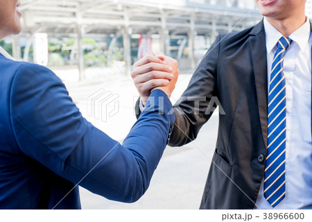 business handshake and teamwork for achievement 38966600