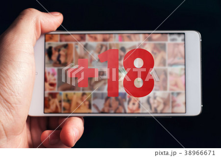 Hand holding smartphone with one hand, 38966671