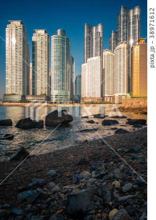 Busan city building and sand beach 38971612