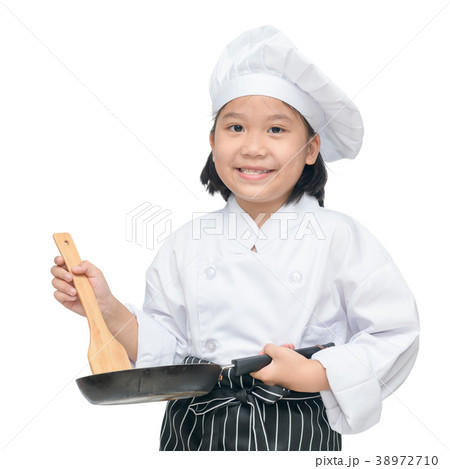 Happy asian girl chef holding cooking utensils 38972710
