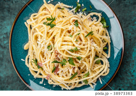 Spaghetti carbonara with egg and pancetta Spaghetti carbonara with egg and pancetta 38973363