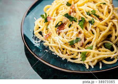 Spaghetti carbonara with egg and pancetta Spaghetti carbonara with egg and pancetta 38973365
