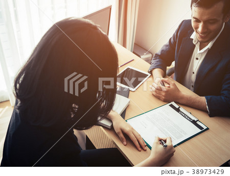 Supervisor smiling between job interviewing Supervisor smiling between job interviewing 38973429