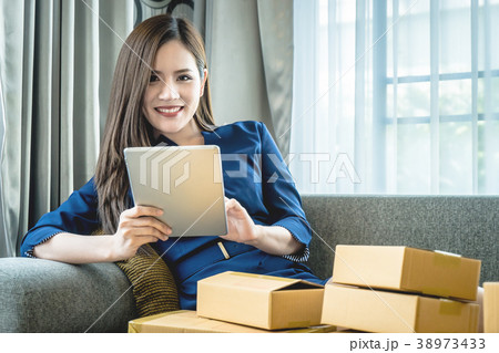 business woman preparing to send out her product business woman preparing to send out her product 38973433