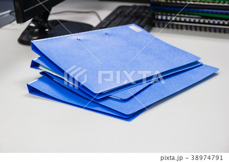 file folder and Stack of business report file folder and Stack of business report 38974791