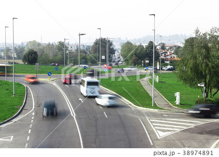 Car traffic around the roundabout 38974891