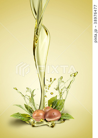 Argan oil splash with argan fruits 38976477