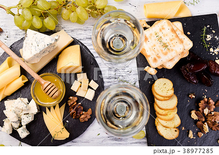 Cheese plate. Cheese plate. Assortment of cheese Cheese plate. Cheese plate. Assortment of cheese 38977285