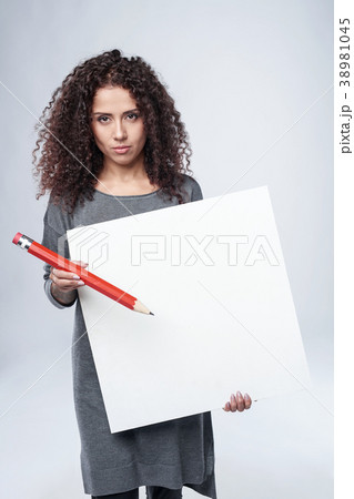 Curly woman with whiteboard Curly woman with whiteboard 38981045