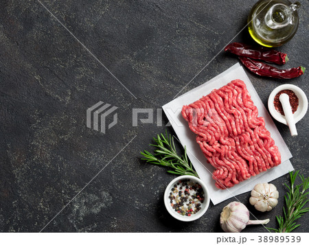 raw minced beef on light gray cement background 38989539