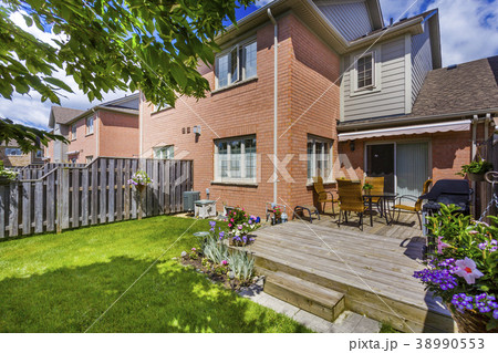 Backyard garden of custom built luxury house in 38990553