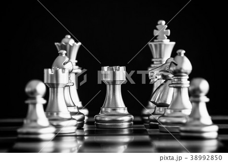 The King in battle chess game stand on chessboard The King in battle chess game stand on chessboard 38992850