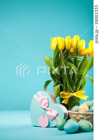 Yellow tulips on blue background 39001555