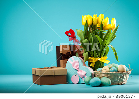 Yellow tulips on blue background Yellow tulips on blue background 39001577