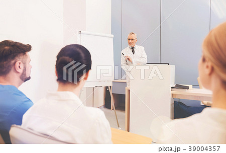 Serious professor explaining new material Serious professor explaining new material 39004357
