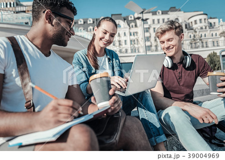 Happy delighted woman working on a laptop 39004969