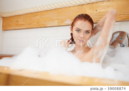 Beautiful woman in a bubble bath Beautiful woman in a bubble bath 39008874