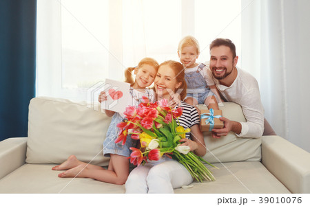 happy mother's day! father and children congratulate mother on h happy mother's day! father and children congratulate mother on h 39010076