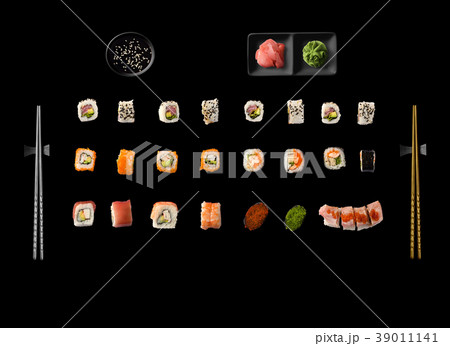 Set of Japanese sushi isolated on black background 39011141