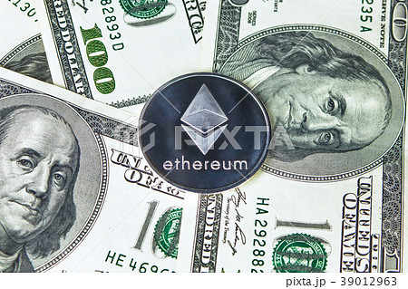 Ethereum and Callisto coins on dollar background. Ethereum and Callisto coins on dollar background. 39012963