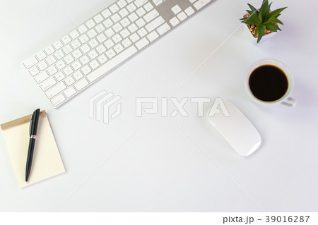 White Workspace with keyboard mouse And notebook White Workspace with keyboard mouse And notebook 39016287