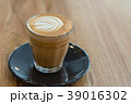 Hot coffee cup on wooden table 39016302