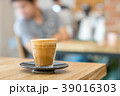 Hot coffee cup on wooden table 39016303