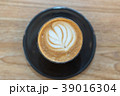 Hot coffee cup on wooden table 39016304