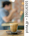 Hot coffee cup on wooden table 39016305