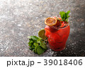 Fresh fruit cocktail on a dark background. 39018406