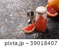 Fresh fruit cocktail on a dark background. 39018407