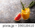 Fresh fruit cocktail on a dark background. 39018410